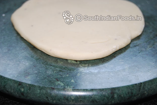 Sprinkle flour roll  out into thick chapatti